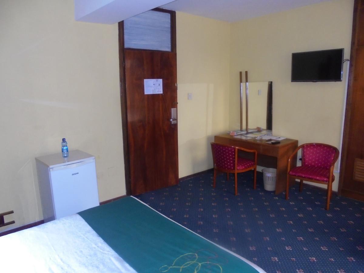 Global Hotel Аддис-Абеба Экстерьер фото