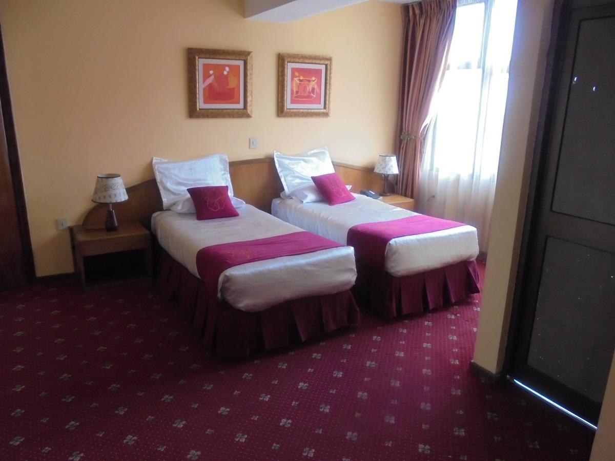 Global Hotel Аддис-Абеба Экстерьер фото