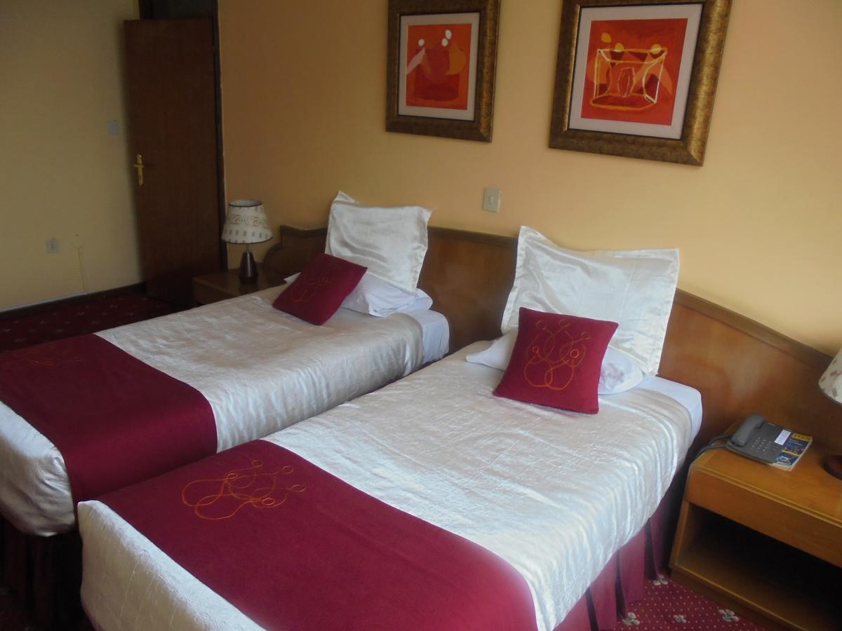 Global Hotel Аддис-Абеба Экстерьер фото